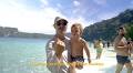 Dad punches two monkeys after they lunged at his son on a beach