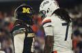 Mizzou cornerback Stephen Hall (0) and Virginia wide receiver Jahmal Edrine (7) exchange words