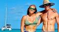 Florida woman who lives on a 39FT catamaran with her husband and their DOG reveals the wildest things about life on the high seas - from how they shower to where their pup POOPS