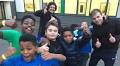 Young Tritons warm up for a team-building 5K challenge