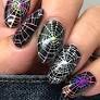 Feel festive for Halloween with this spider web nail art breakdown
