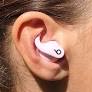 We are music-loving fitness pros — here are the sports earbuds we recommend