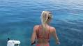 Fisherwoman Has Everyone's Attention On Water In Pink Swimsuit