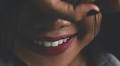 Why does bad news make some people smile?