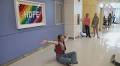 Girl unveils Lego 'Hope' sign at hospital that treated her cancer