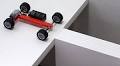 A Remote Controlled LEGO Car Is Repeatedly Modified to Cross Increasingly Narrower Bridges