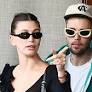 Justin Bieber can't keep his hands off wife Hailey in rare PDA moment after she spoke on 'surprise' pregnancy
