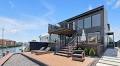 $1.5M waterfront house renovated to have 'Brooklyn loft vibe'