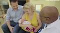 'What a Wonderful World.' Singing Doctor' who serenaded 8,000 babies Honored after 40 years of lullabies