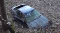 This 'Unrecoverable' Toyota Supra Lies Half Buried On The Side Of A Hill In Japan
