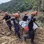 54 people are confirmed dead in a landslide that buried a gold-mining village in south Philippines
