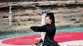 Enthusiasts perform Kung Fu at Wudang Mountain