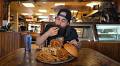 This competitive eater and YouTuber now holds Rotterdam's Wagon Train BBQ Graveyard Burger challenge record