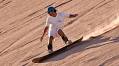 The sandboarder who rides dunes like waves