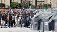 Clashes injure 120 at protest against Mexico president