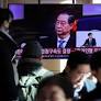 S.KOREA APPEALS COURT REDUCES SENTENCE FOR EX-PM HAN TO 15 YRS IN INSURRECTION TRIAL