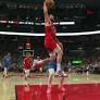 Sandro Mamukelashvili somehow gets the and-1 to fall