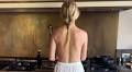 Gwyneth Paltrow puts on a very cheeky display as she cooks topless and serves up a 'boyfriend breakfast'