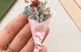Artist “Grows” Tiny Paper Flowers That Will Stay in Bloom Forever