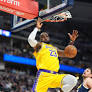 LeBron James breaks another Kareem Abdul-Jabbar record, but hurts his elbow in loss