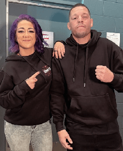 Nate Diaz backstage at last night's RAW alongside Bayley : r/WWE