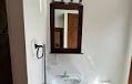 Before & After: A 100-Year-Old Bathroom Got a Makeover with Design Details It “Deserved”