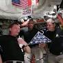 Artemis II carries Apollo 18 flag designated for canceled moon mission
