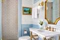 Wall covering adds playful touch to bathroom in classic antique home