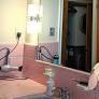 Original 1950s Pink Tile Was Saved in This Bold, Beachy $500 Bathroom Redo