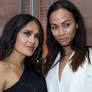 Salma Hayek and Zoe Saldaña turn heads on glamorous double date in Venice with contrasting fashion looks