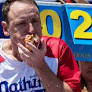 Joey Chestnut to defend hot dog eating title while on probation after pleading guilty to battery