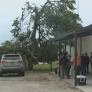 Community works to clear debris, provide resources after tornadoes tear through Atoka, Johnston Counties