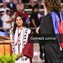 Licensable picture: Mariana Ramirez-Morales waits to receive the last diploma from Principal Michele Reid during Mt. Whitney High School’s