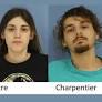 Trio booked after cops find hundreds of pot vapes, thousands of dollars