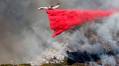 Aerial assault aims to stem spread of Palisades Fire in Los Angeles