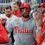 Bryce Harper leads Phillies past Braves 8-5 in 10 innings to stop 10-game losing streak