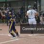 Licensable picture: Emma Neace scores a run for Flat Rock as the throw arrives late to Whiteford catcher Rory Vida during a 3-2 Flat Rock victory on