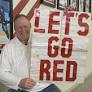 'Sign guy' legacy lives on as friend takes over beloved Badgers game-day tradition