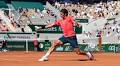 Roger Federer eases to comfortable win over Denis Istomin on slam return