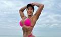 Bodybuilder pornstar robbed as armed gang drags her out of £100k car by hair