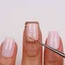 Kourtney Kardashian's sheer, nude manicure features a romantic detail
