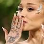 Ariana Grande debuts fresh tattoos on social media, setting the internet on fire