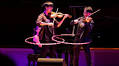 TwoSet Violin pulls a young, enthusiastic audience to Symphony Center: ‘Classical music can compete with brainrot’