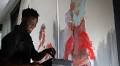Olympian-artist Luc Abalo creates frescoes with residents at a care center