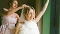 This Copenhagen bride spent 50 hours hand-sewing feathers onto her sheer wedding dress