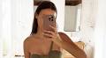 Made In Chelsea's Lucy Watson shows off her jaw-dropping figure in a daring cut-out swimsuit as she enjoys an idyllic £1K per night Maldives getaway