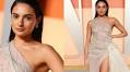 Paige DeSorbo Evokes ‘Wet’ Dressing in Draped Sheer Maë Paris Look With Slicked-back Hair to Cohost 2025 Vanity Fair Oscar Party Red Carpet