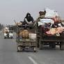 Thousands flee Syria’s Homs as opposition forces advance on key city