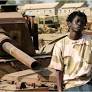 From Child Soldier to Hip-Hop Artist (Published 2008)