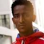 Eritrea's flag-carrying runner seeks asylum in UK to flee repressive regime